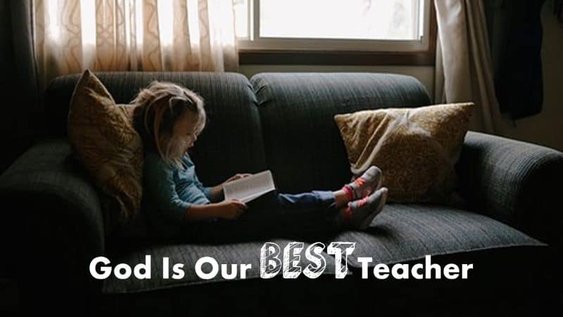 young girl reading Bible on couch