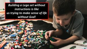 Little boy trying to build a lego set