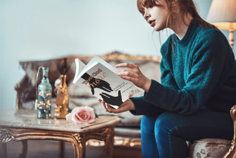 young woman reading book, Trust God MORE