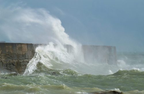 Crashing waves against rock